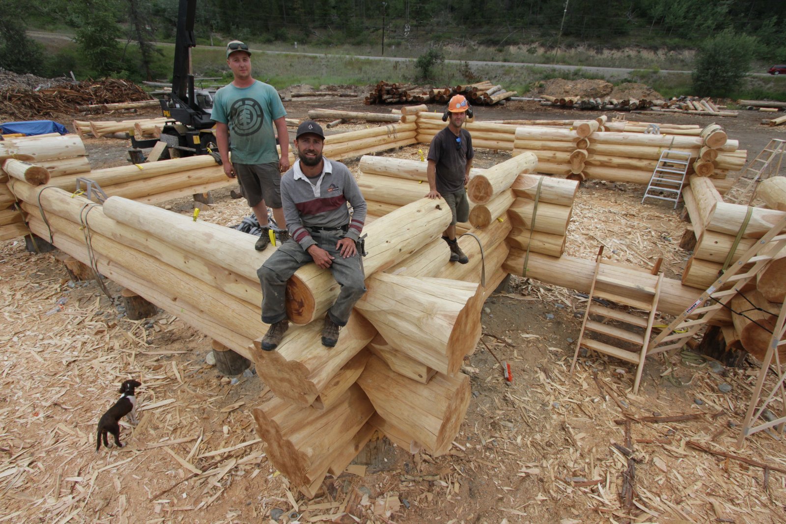 Carl Lauren of Tyee Log and Timber Homes in Kimberley B.C. wanted to promote energy efficiency in home building so he pushed City Hall to start a program. Pictured is the crew that hand builds log homes at Tyee in Kimberley. Photo David Dodge, GreenEnergyFutures.ca