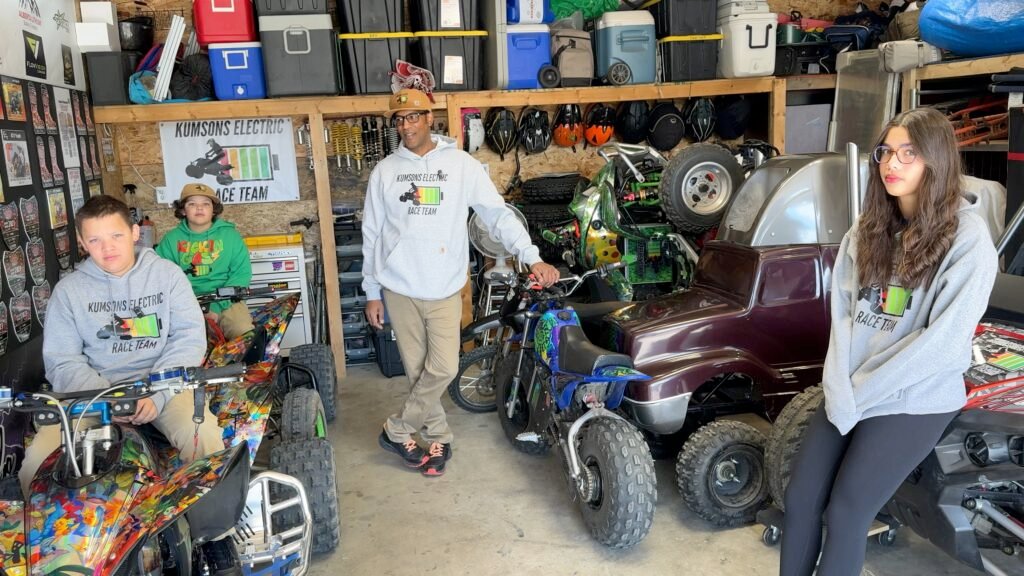 407. Tearing up the Track with Electric Quads – Kumson’s Electric Race Team 2 Kumson Race Team in Garage