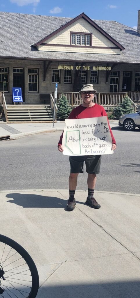 408. Calgary's Climate Change Sign Guy takes his message to the streets of Alberta's oil capital 13 Roger High River