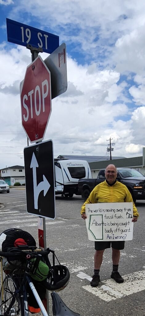 408. Calgary's Climate Change Sign Guy takes his message to the streets of Alberta's oil capital 14 Roger in Nanton