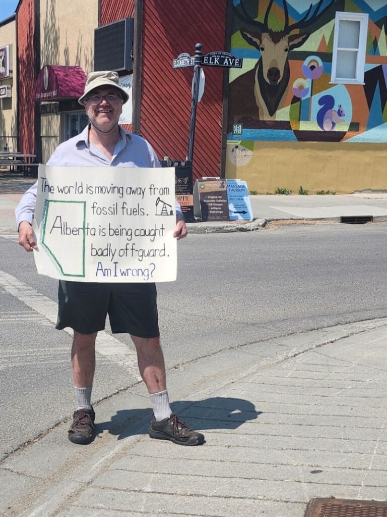 408. Calgary's Climate Change Sign Guy takes his message to the streets of Alberta's oil capital 15 Roger in Okotoks