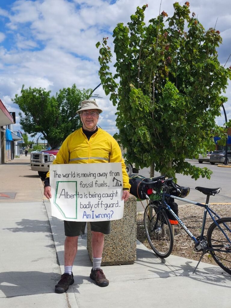 408. Calgary's Climate Change Sign Guy takes his message to the streets of Alberta's oil capital 16 Roger in Vulcan