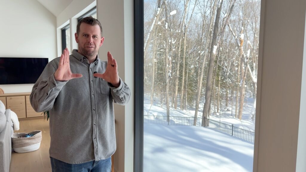 Kyle New Newman by window for TITLE 1